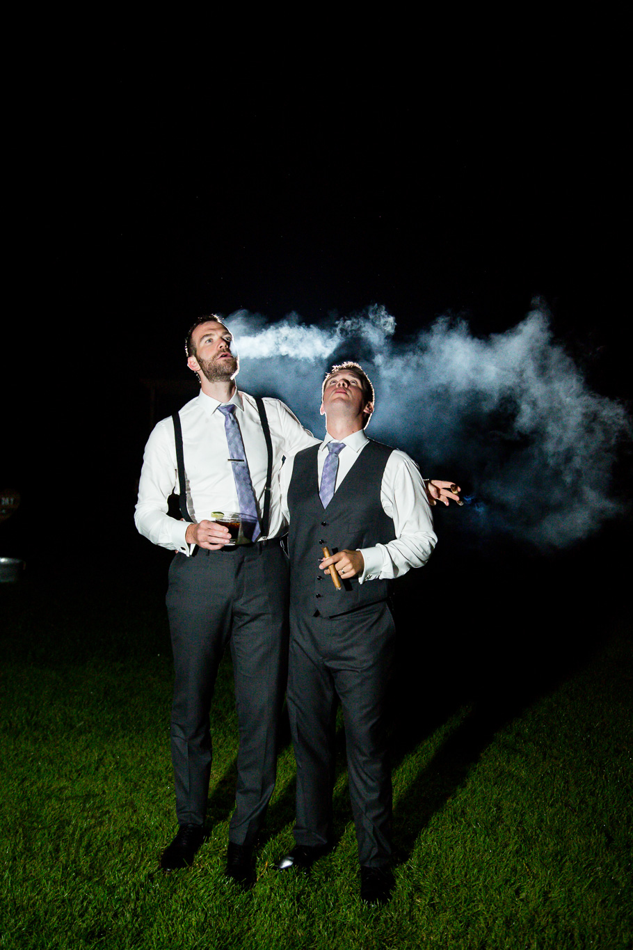 groomsment with cigars dramatic