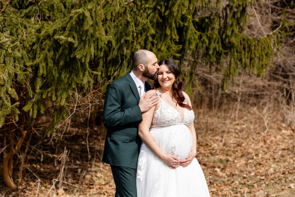 pregnant bride smiles at camera wedding photography london ontario